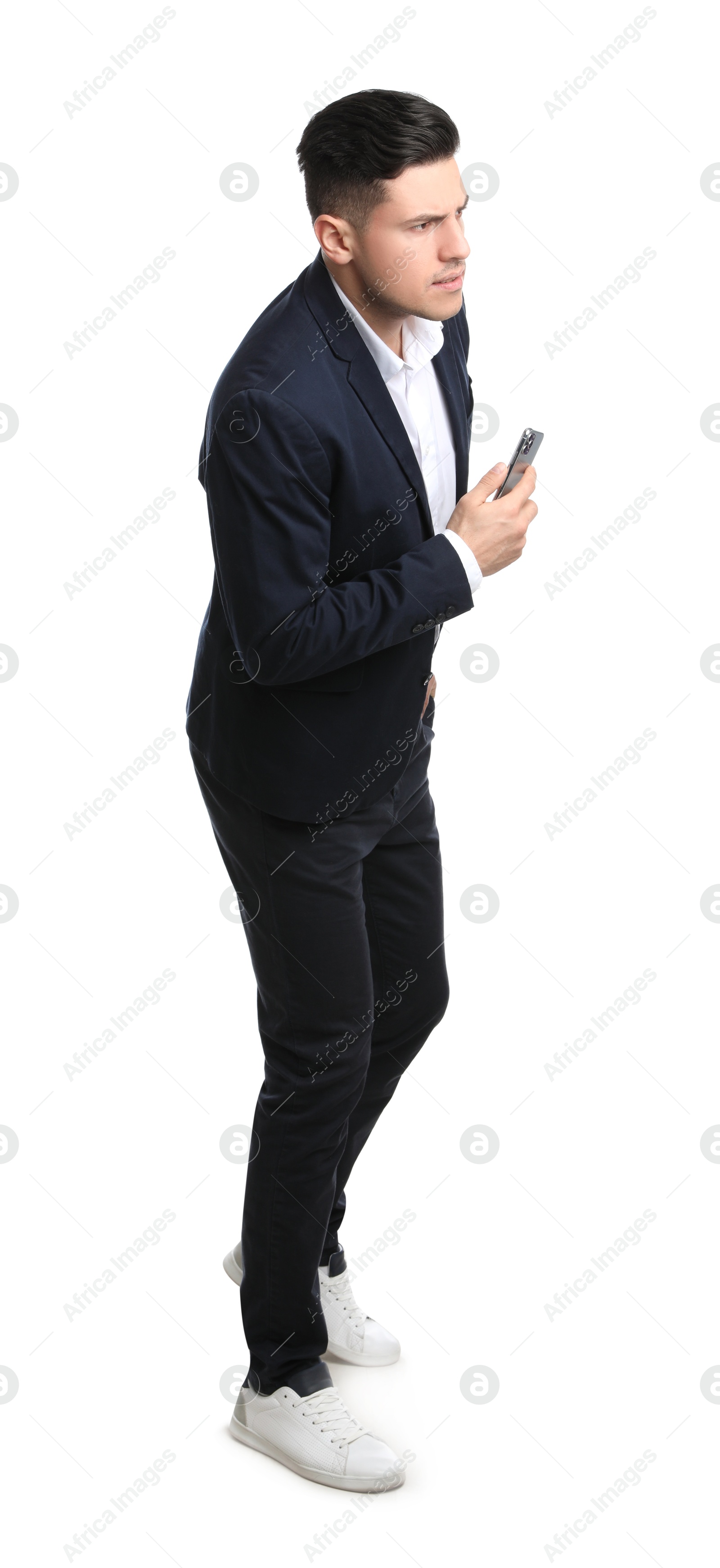 Photo of Businessman in suit with smartphone on white background