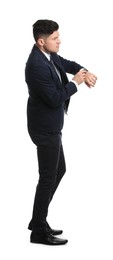 Businessman in suit waiting on white background