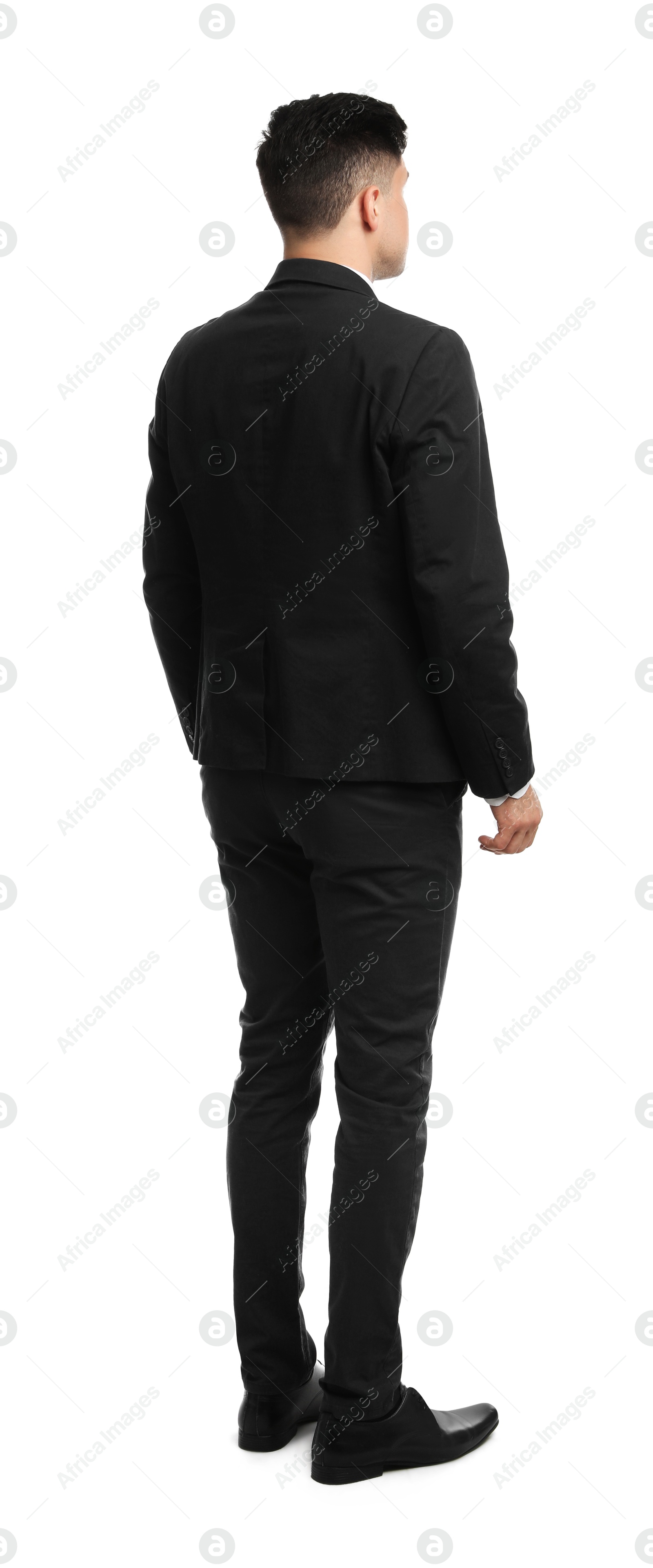 Photo of Businessman in suit on white background, back view