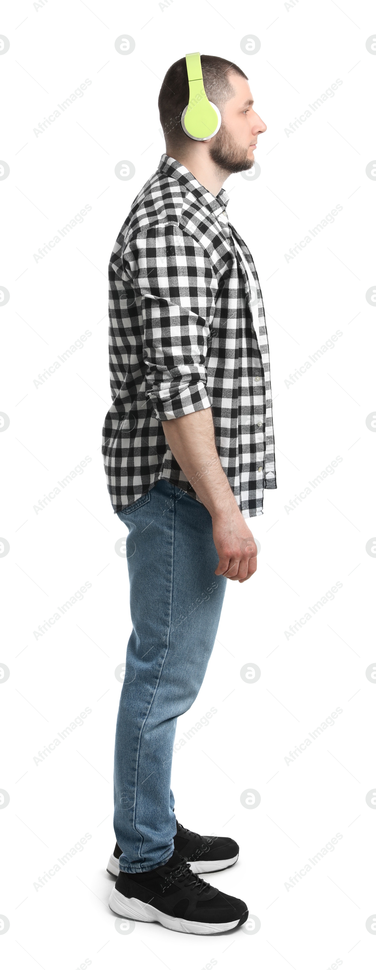 Photo of Man in casual clothes with headphones on white background