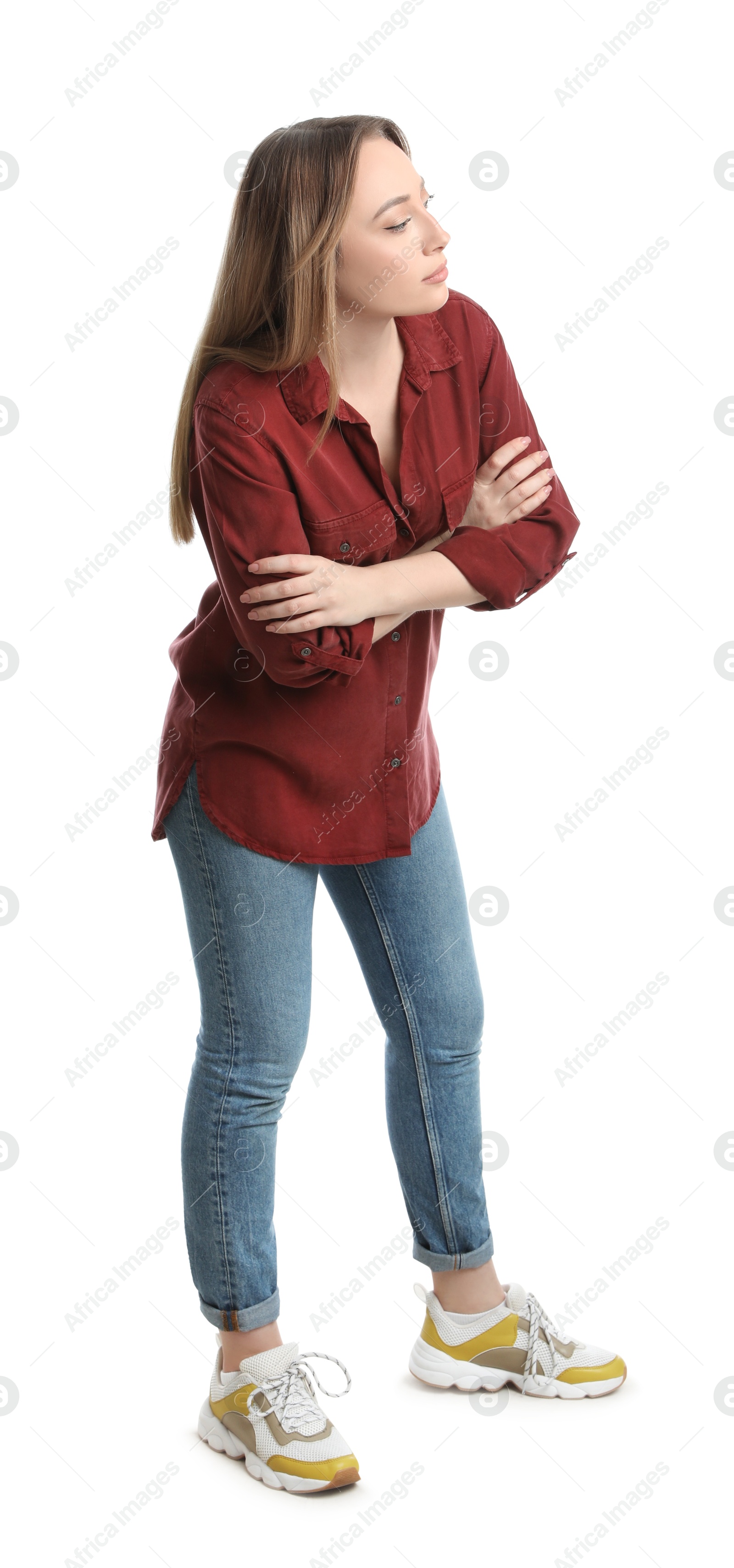 Photo of Young woman in casual outfit on white background