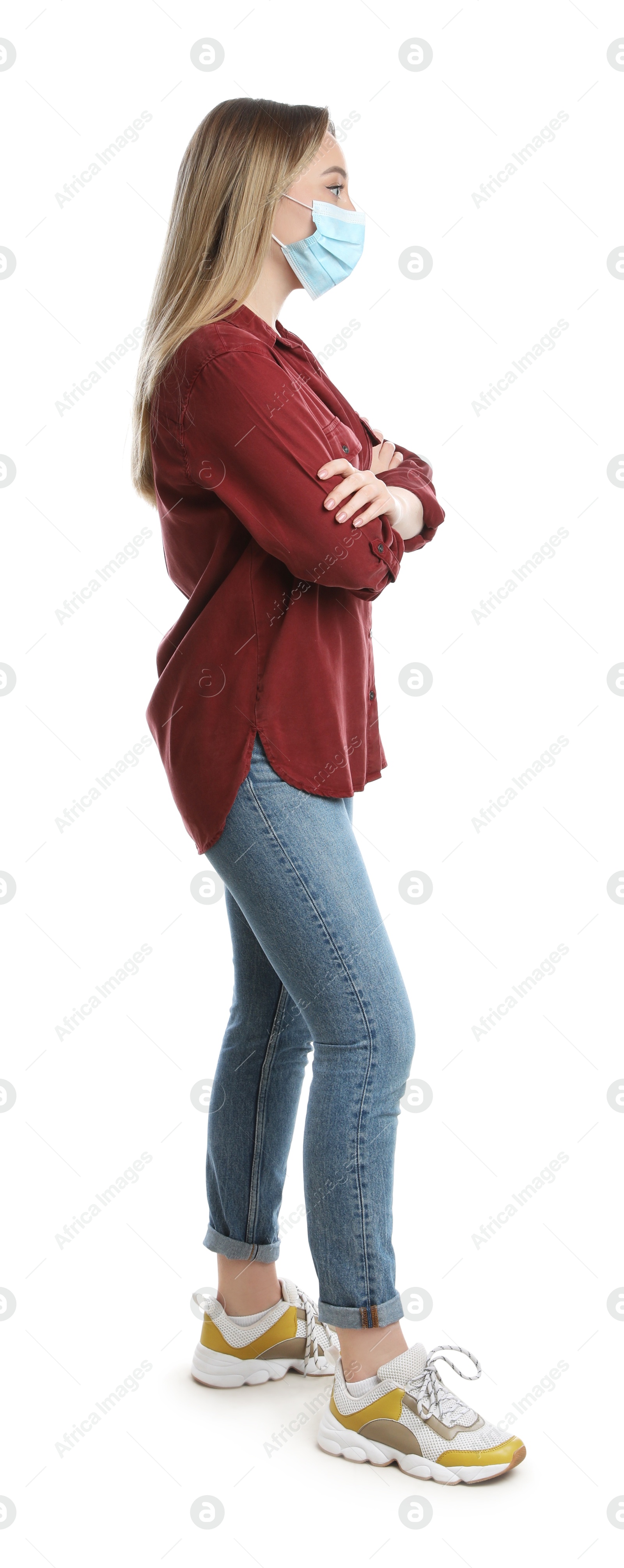 Photo of Young woman with protective mask on white background