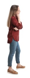 Young woman in casual outfit on white background