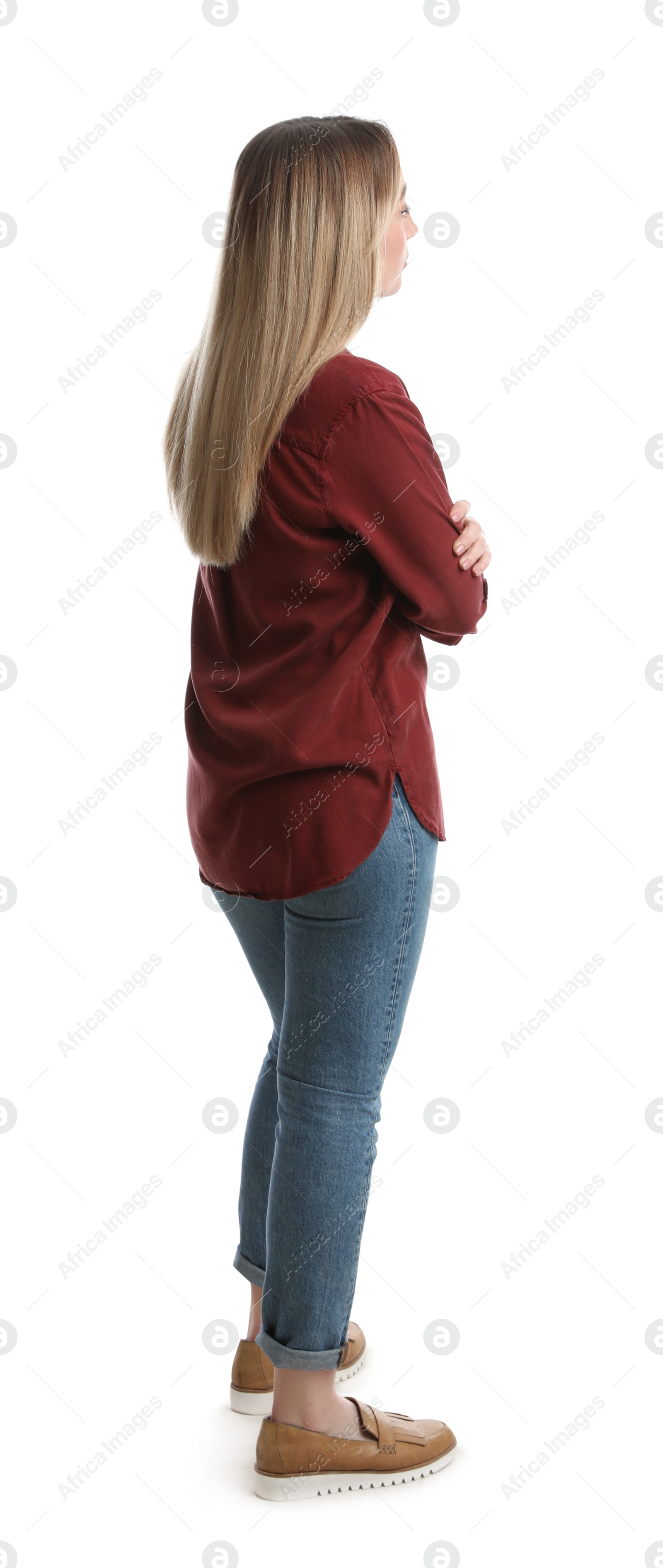 Photo of Woman in casual outfit on white background, back view