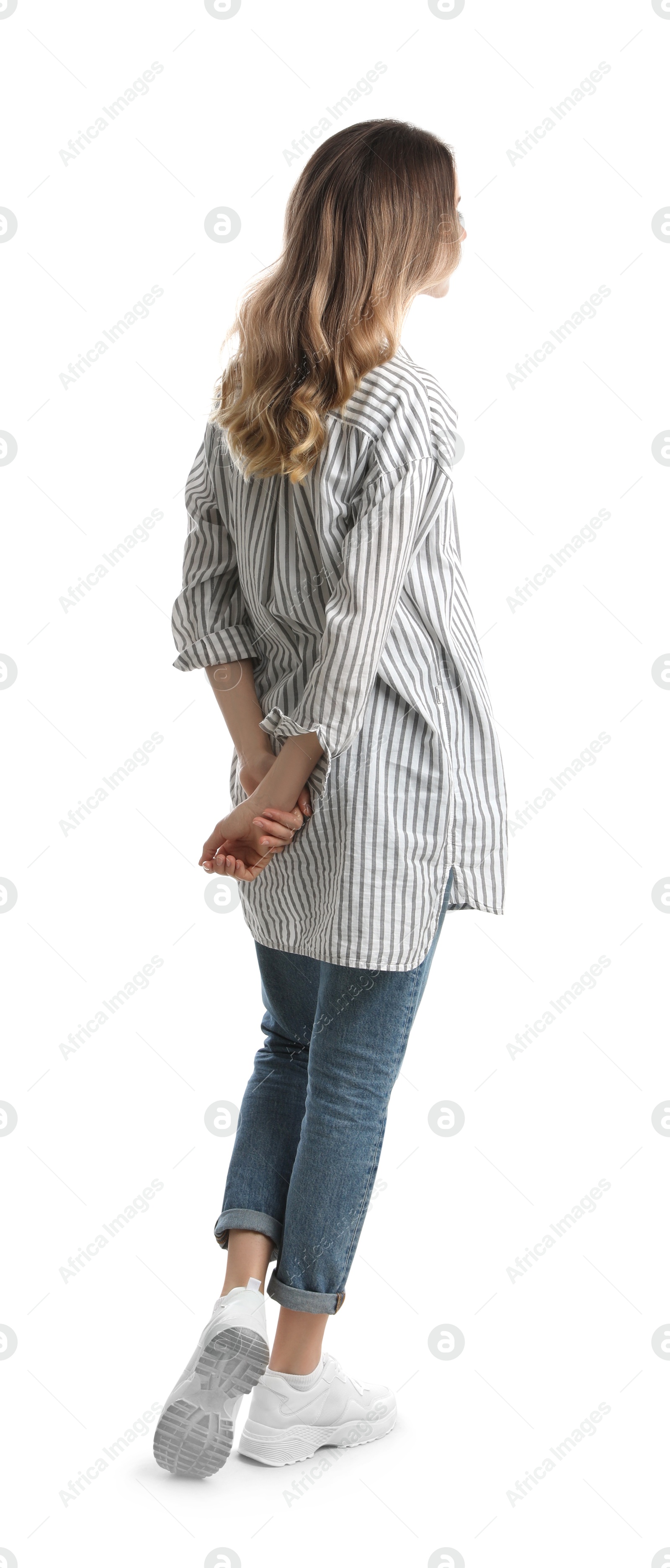 Photo of Woman in casual outfit on white background, back view