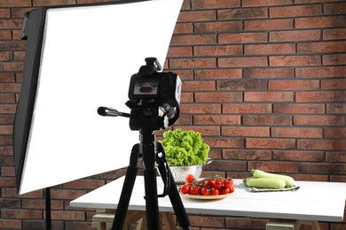 Shooting food in photo studio with professional lighting equipment