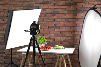 Photo of Shooting food in photo studio with professional lighting equipment