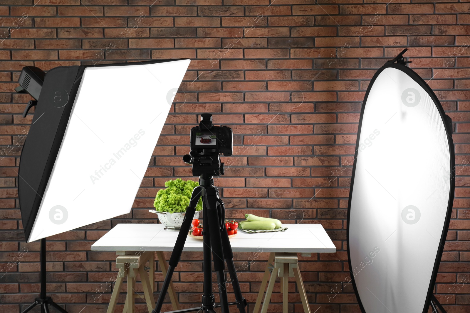 Photo of Shooting food in photo studio with professional lighting equipment