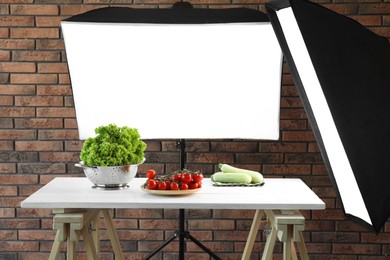 Photo of Shooting food in photo studio with professional lighting equipment