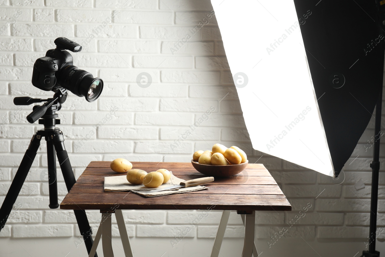 Photo of Shooting food in photo studio with professional lighting equipment