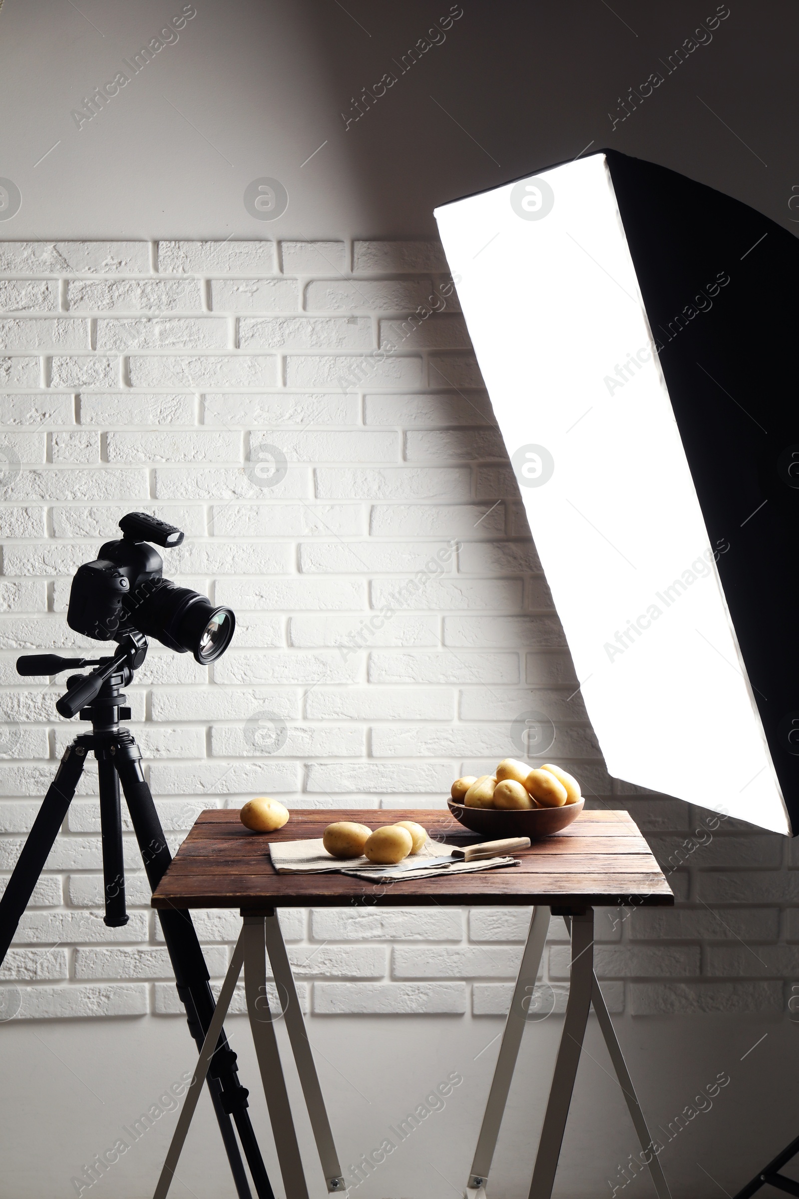 Photo of Shooting food in photo studio with professional lighting equipment