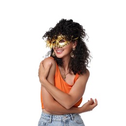 Smiling young woman in carnival mask isolated on white