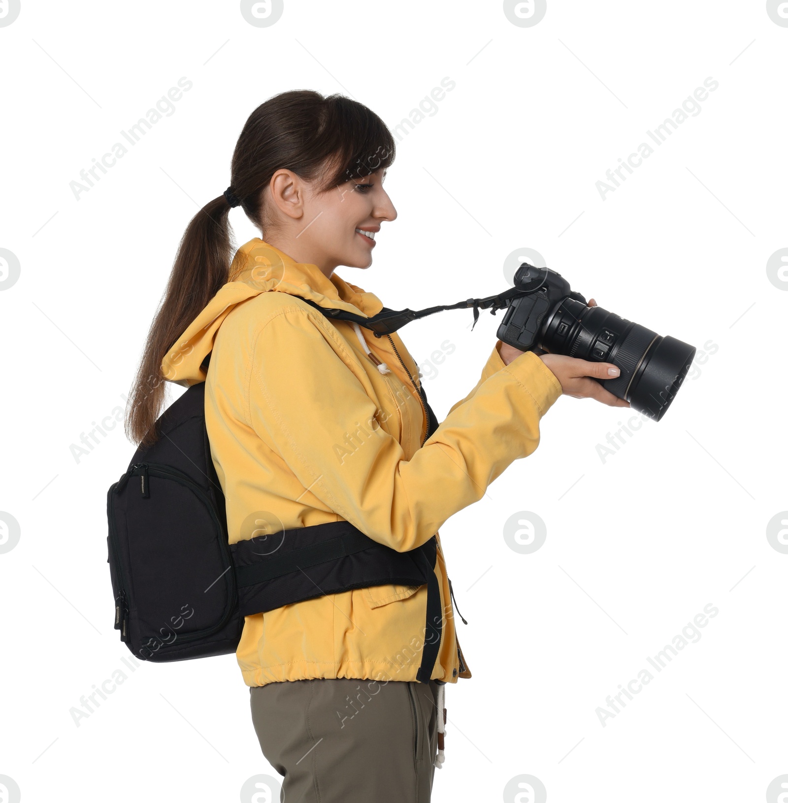 Photo of Photographer with backpack and camera on white background