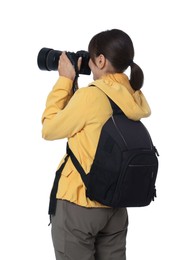 Photo of Photographer with backpack and camera taking picture on white background