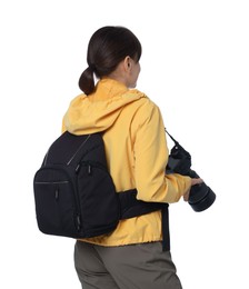 Photographer with backpack and camera on white background