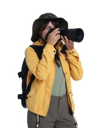 Photo of Photographer with backpack and camera taking picture on white background