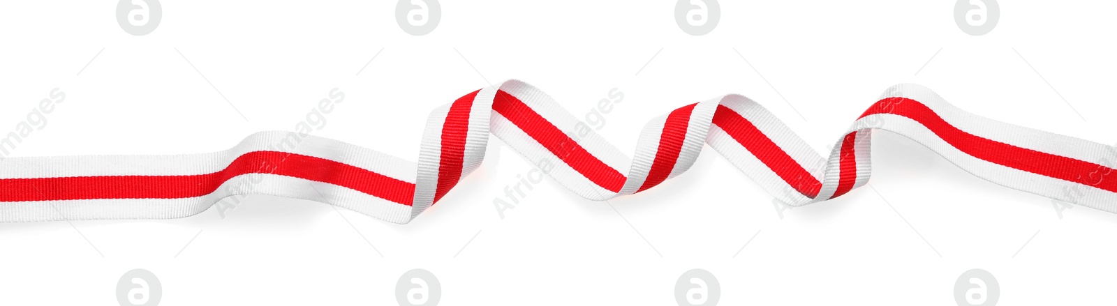 Photo of Colorful striped ribbon isolated on white, top view