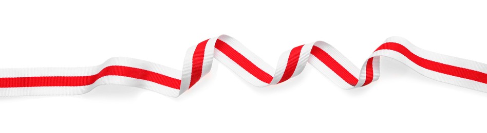 Photo of Colorful striped ribbon isolated on white, top view