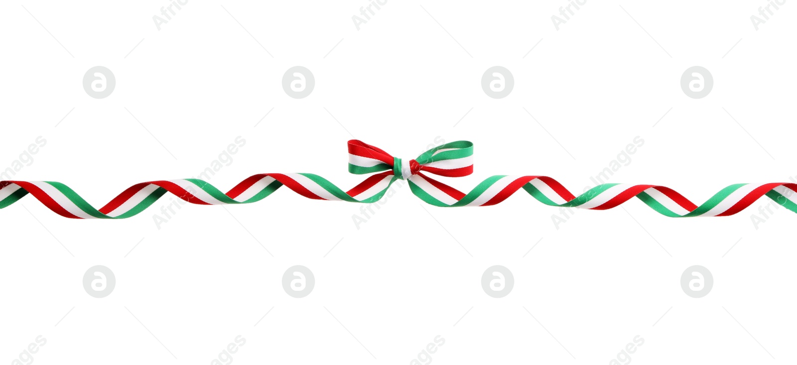 Photo of Ribbon bow with Hungary flag pattern isolated on white, top view