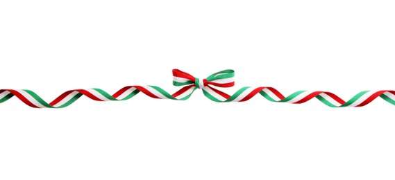 Photo of Ribbon bow with Hungary flag pattern isolated on white, top view