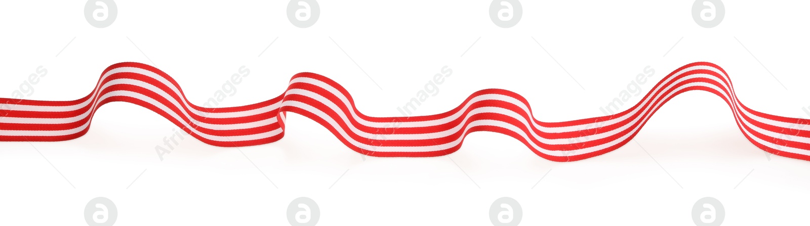 Photo of One colorful striped ribbon isolated on white