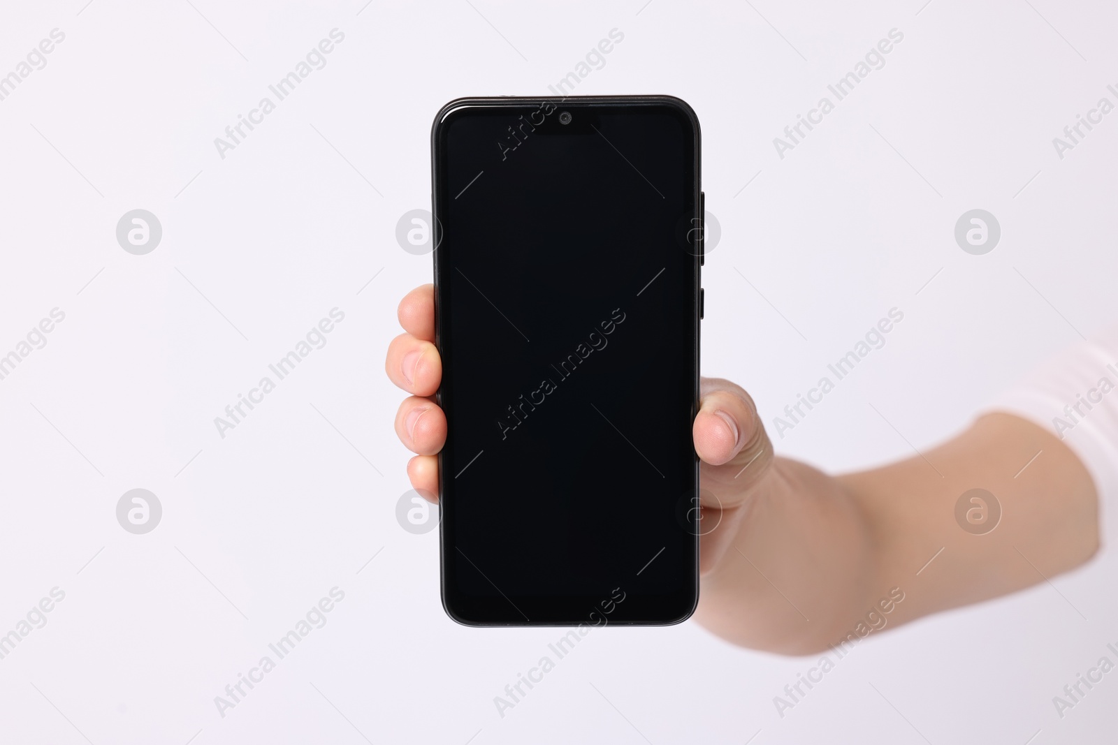 Photo of Woman holding smartphone with blank screen on white background, closeup