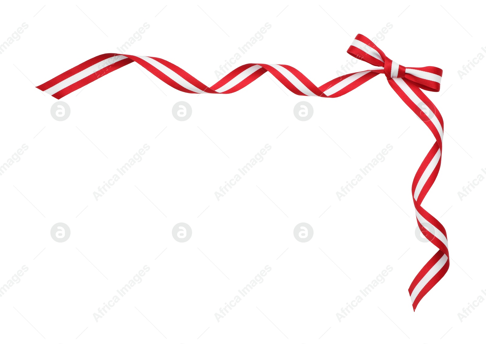 Photo of Ribbon with bow in colors of Austrian flag isolated on white