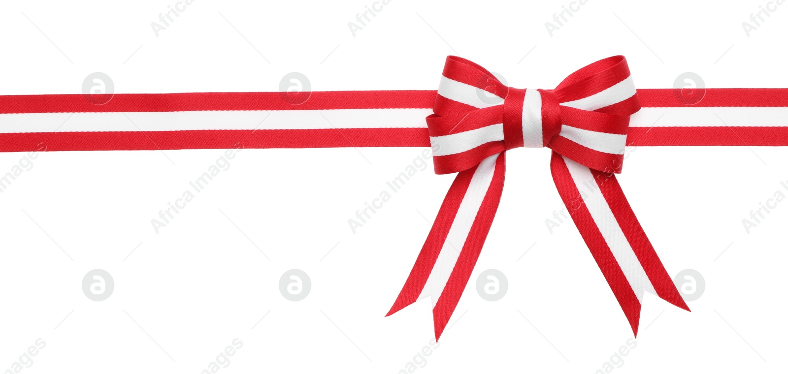 Photo of Ribbon with bow in colors of Austrian flag isolated on white