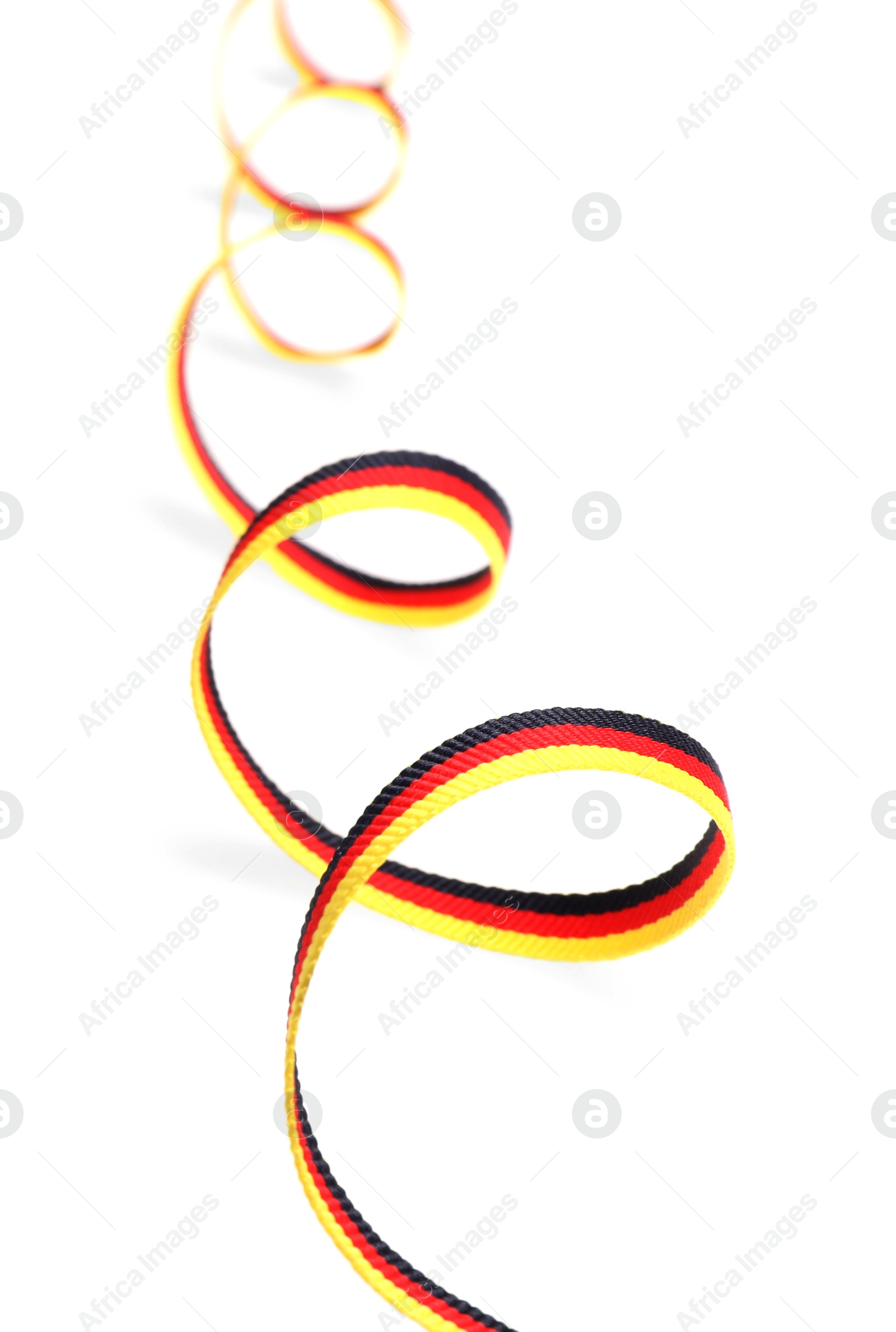 Photo of Ribbon in colors of German flag isolated on white