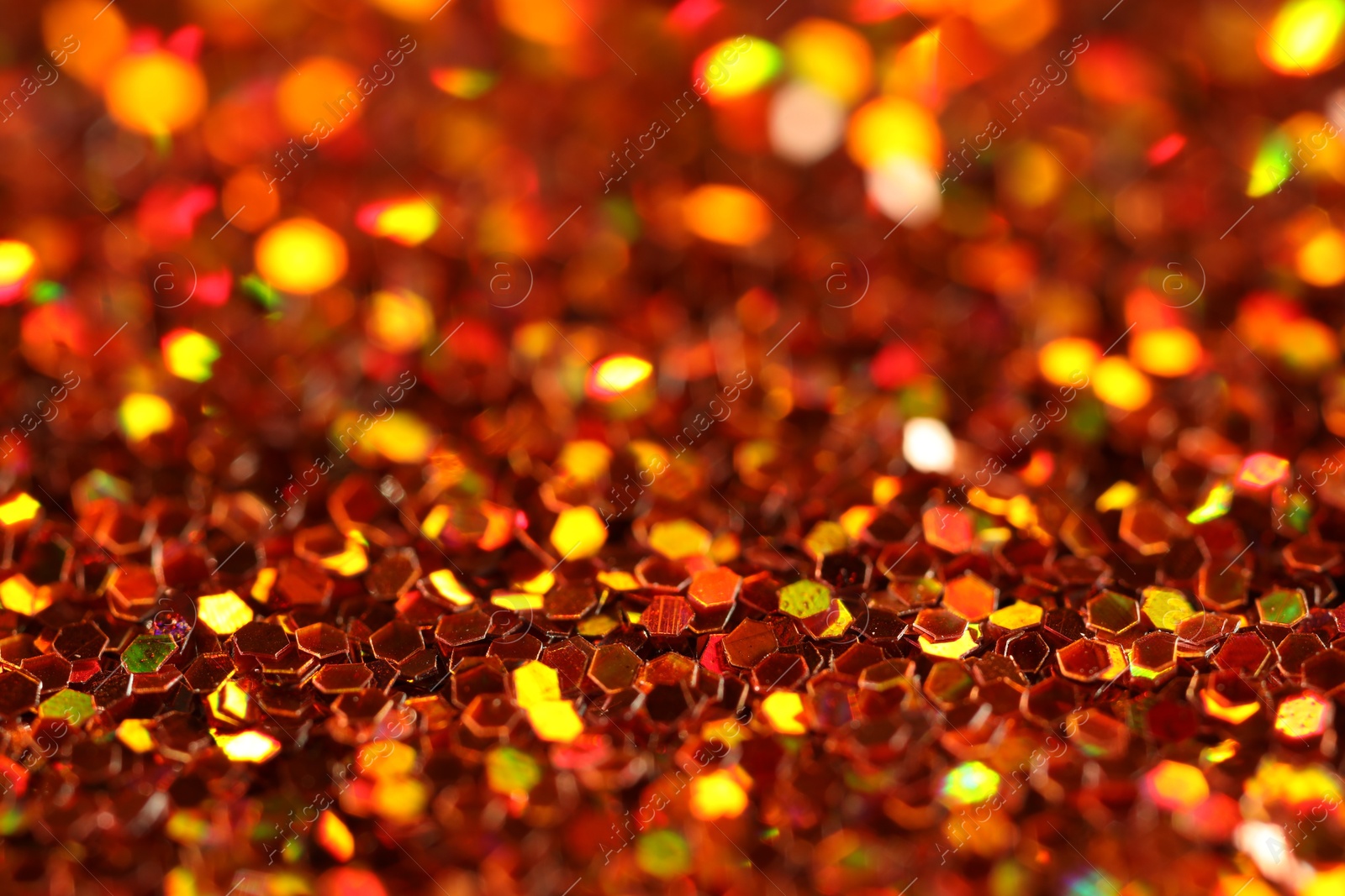 Photo of Beautiful shiny golden glitter as background, closeup