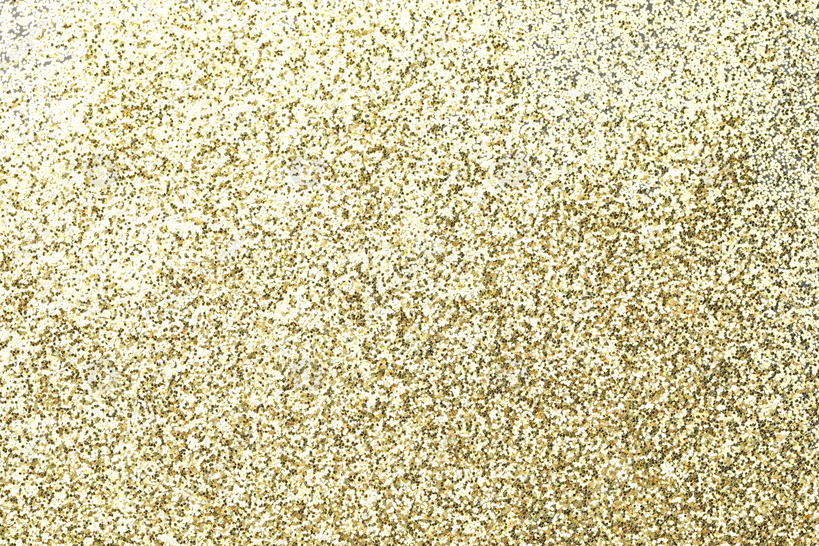 Photo of Beautiful shiny golden glitter as background, top view