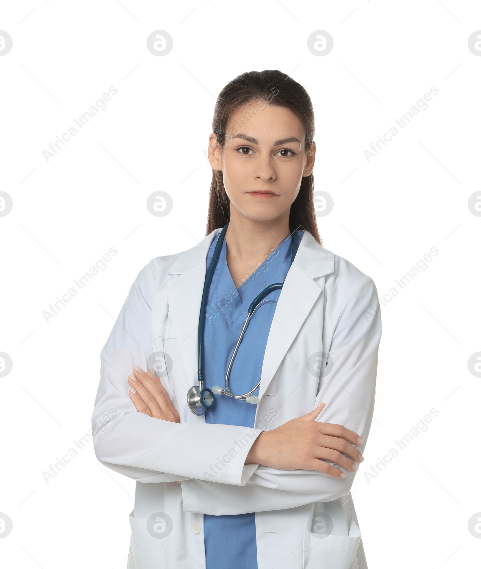 Photo of Portrait of beautiful nurse with crossed arms on white background