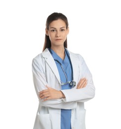 Portrait of beautiful nurse with crossed arms on white background