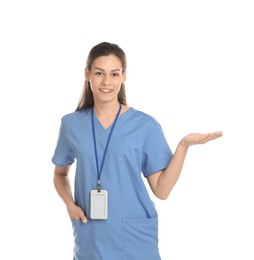 Smiling nurse holding something on white background