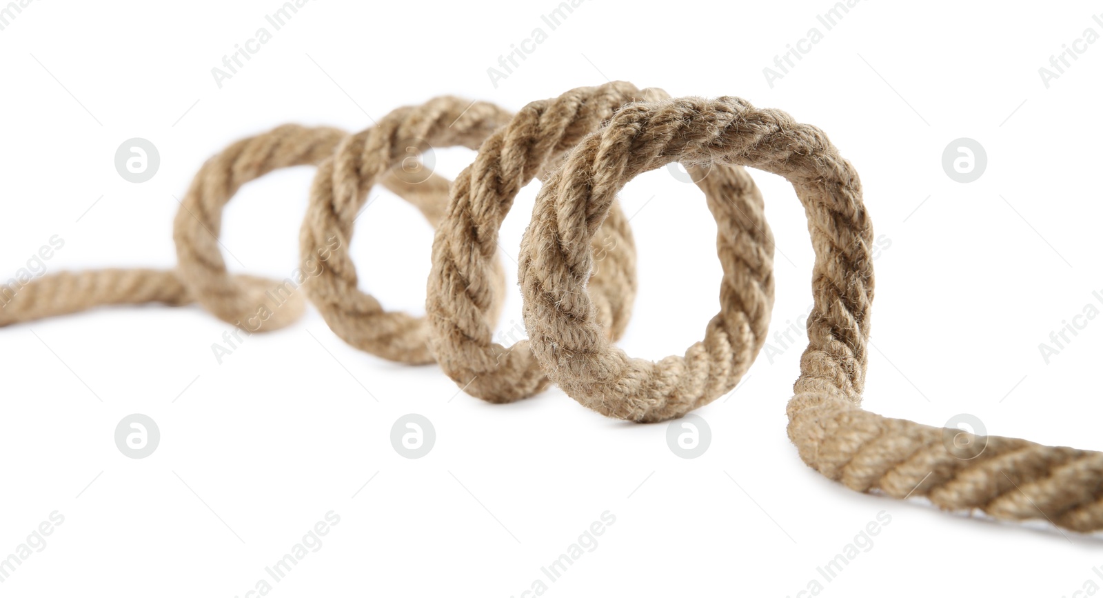 Photo of Hemp rope isolated on white. Organic material