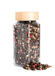 Photo of Peppercorns in glass jar isolated on white