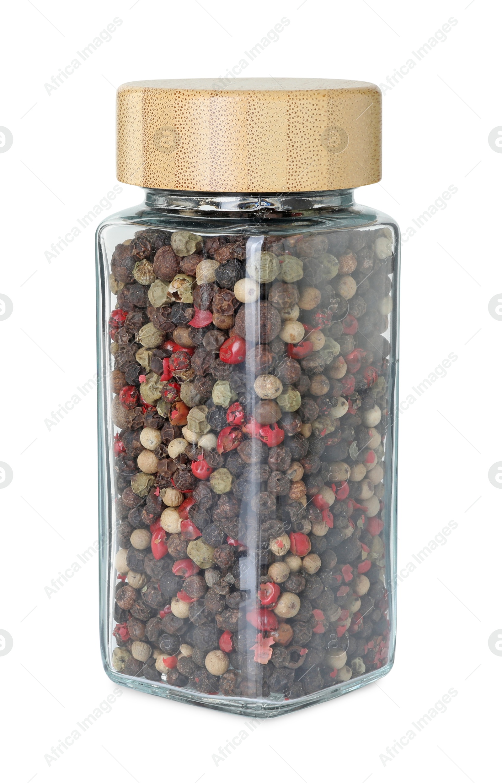 Photo of Peppercorns in glass jar isolated on white