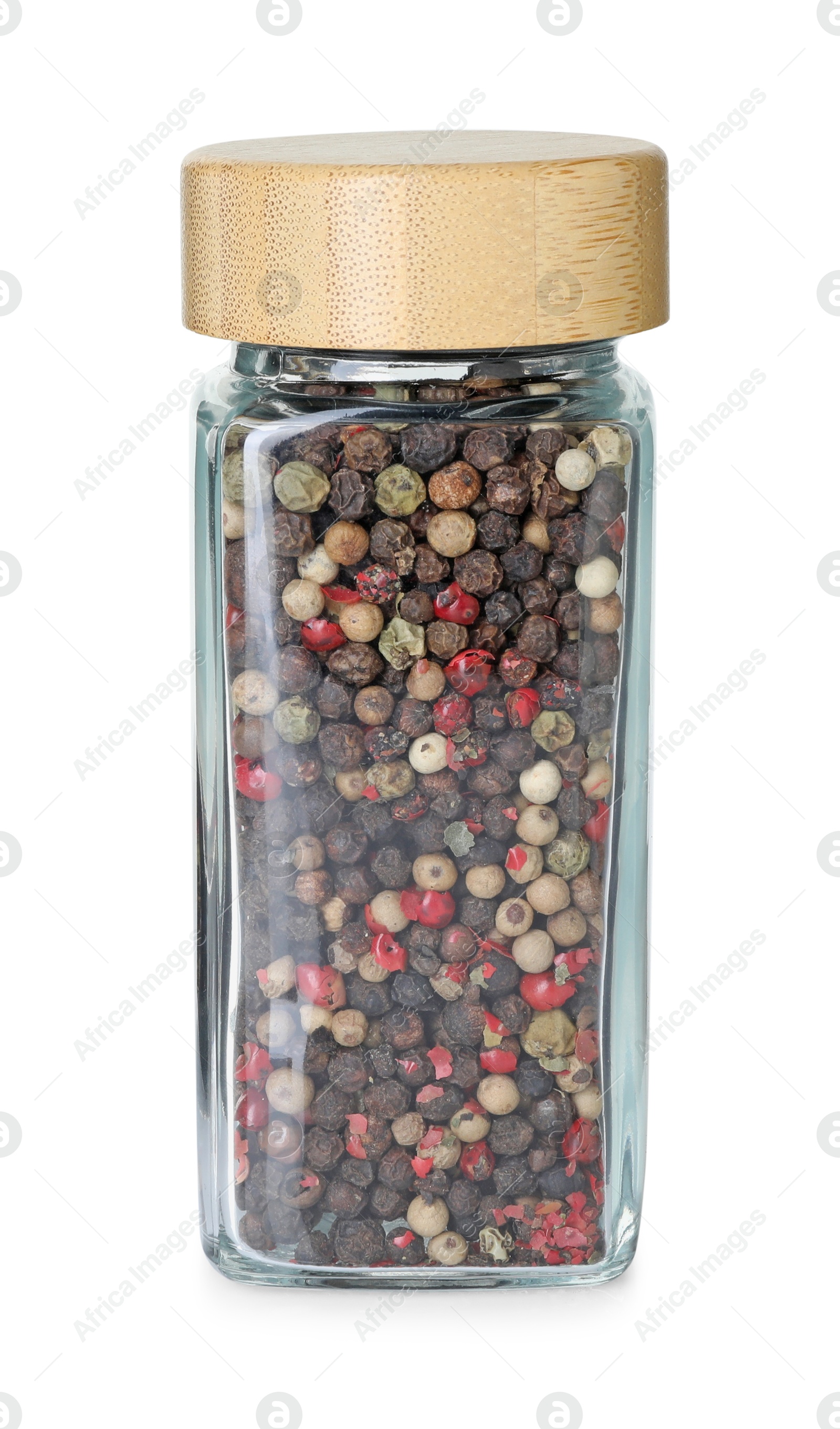 Photo of Peppercorns in glass jar isolated on white