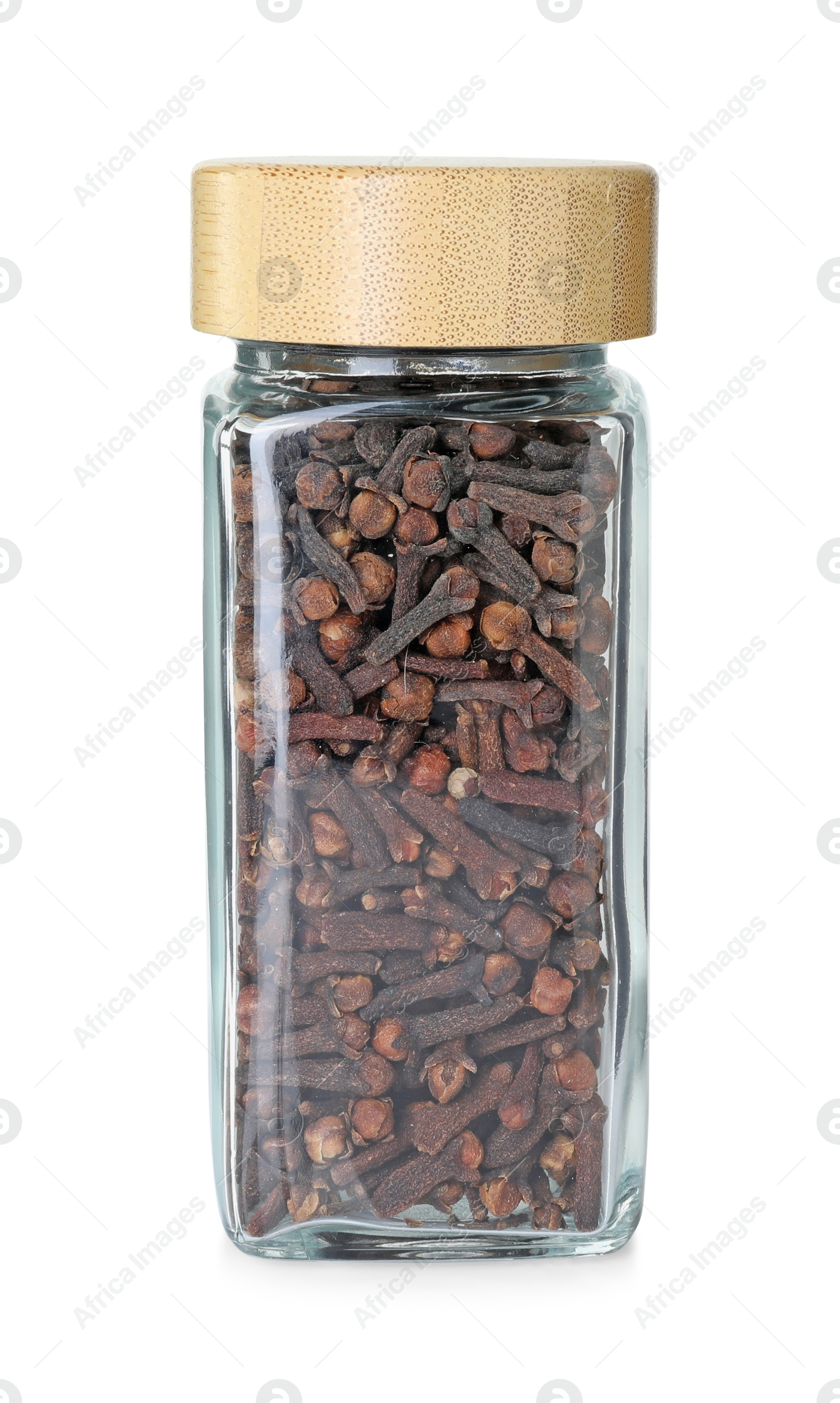 Photo of Clove buds in glass jar isolated on white