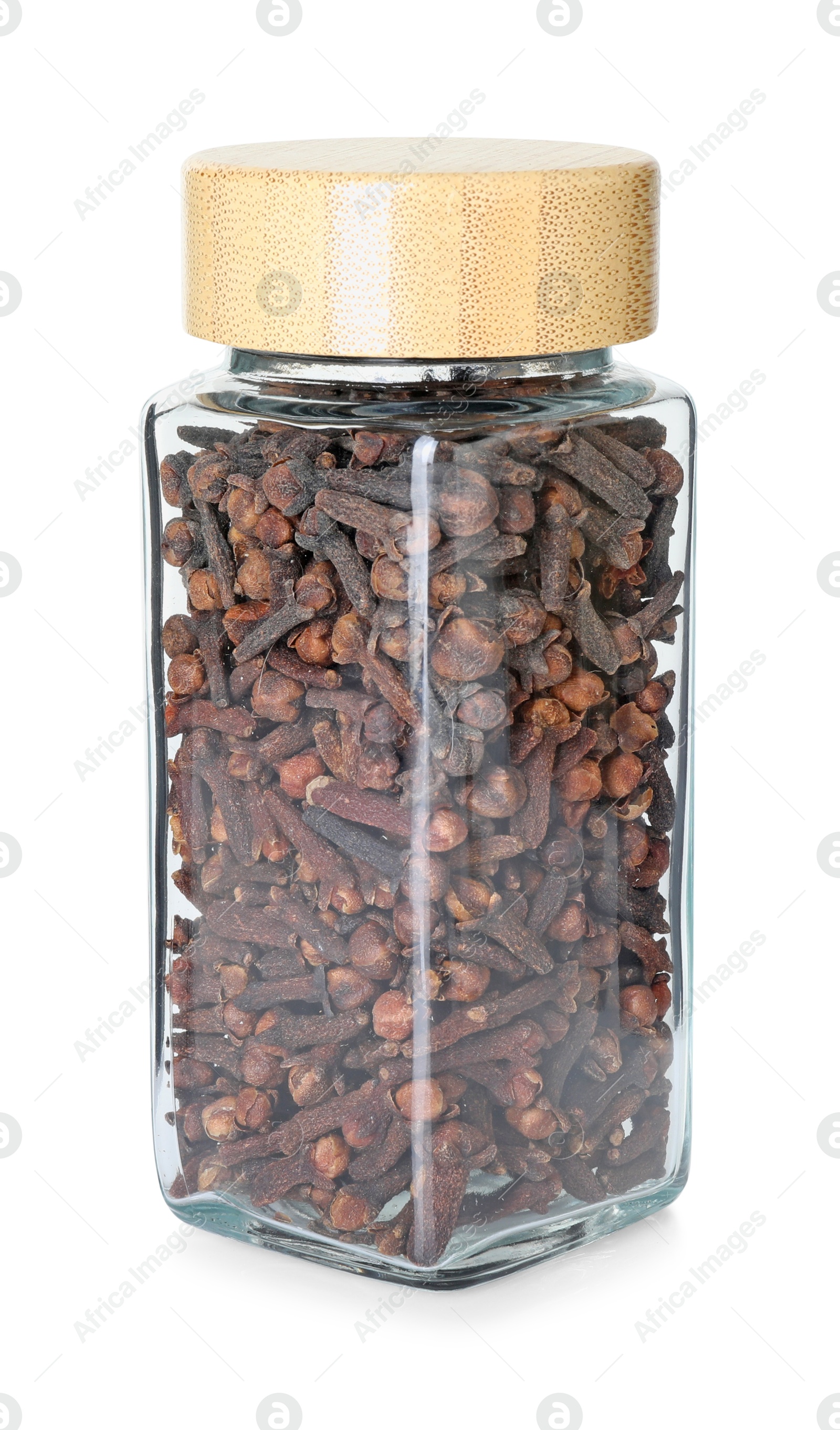 Photo of Clove buds in glass jar isolated on white