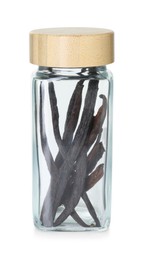 Photo of Vanilla pods in glass jar isolated on white