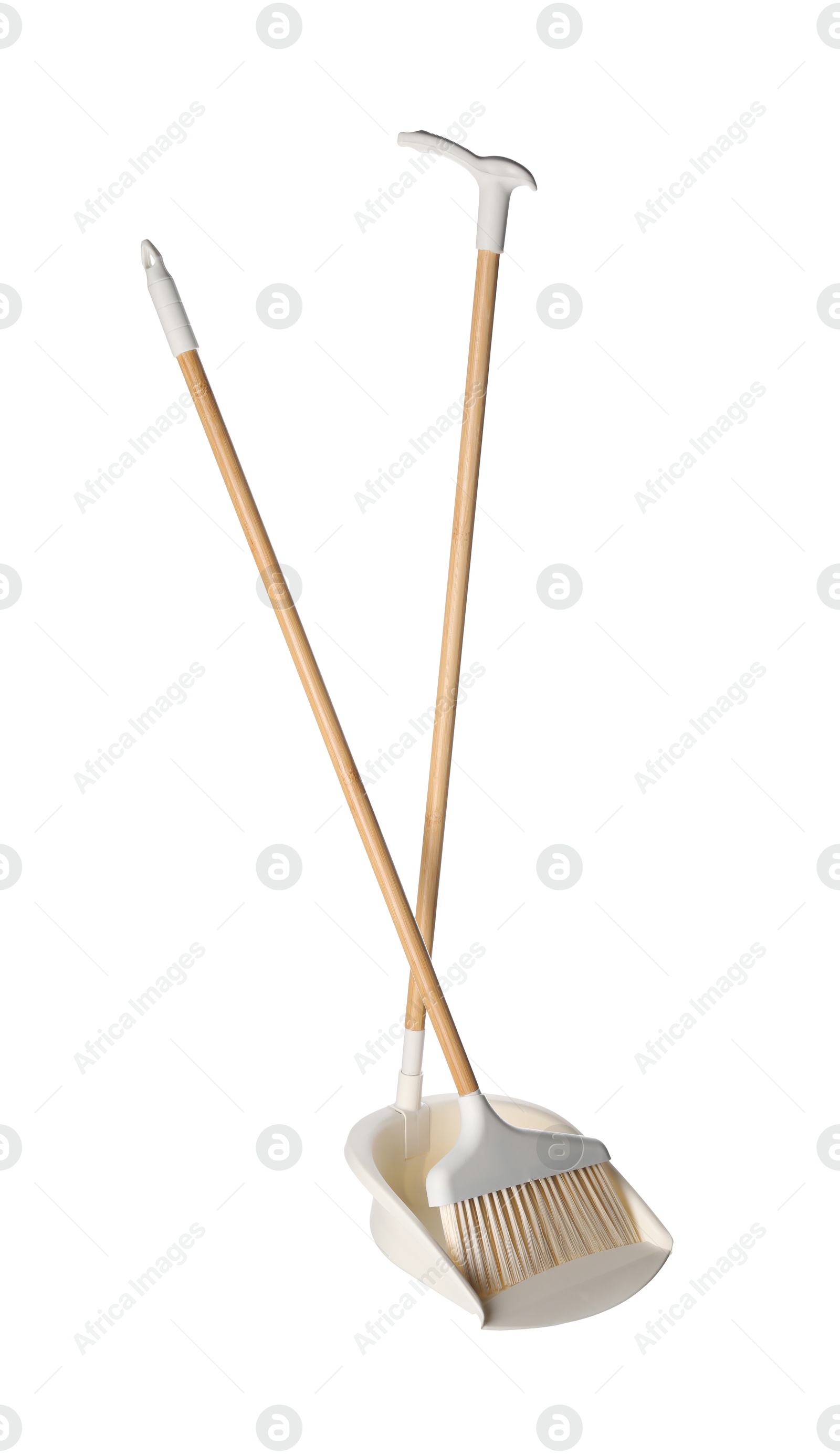 Photo of Broom and dustpan isolated on white. Cleaning tools