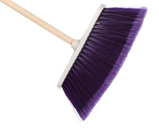 Photo of One broom isolated on white. Cleaning tool