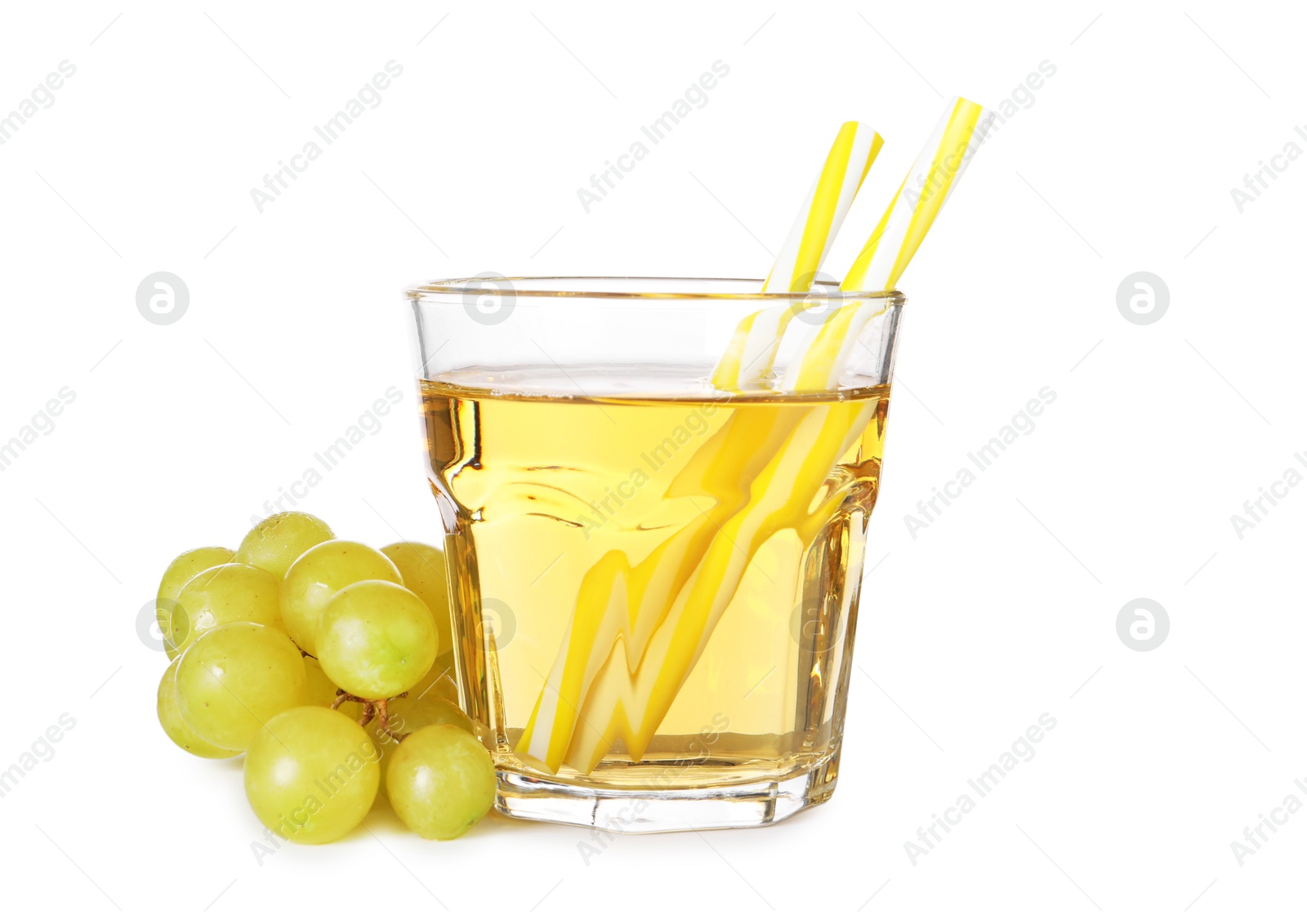 Photo of Ripe grapes and glass of tasty juice isolated on white