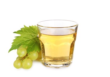 Photo of Ripe grapes and glass of tasty juice isolated on white