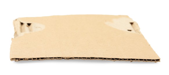 Photo of Piece of brown cardboard isolated on white