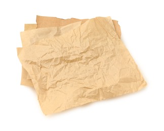 Photo of Crumpled kraft paper sheets isolated on white