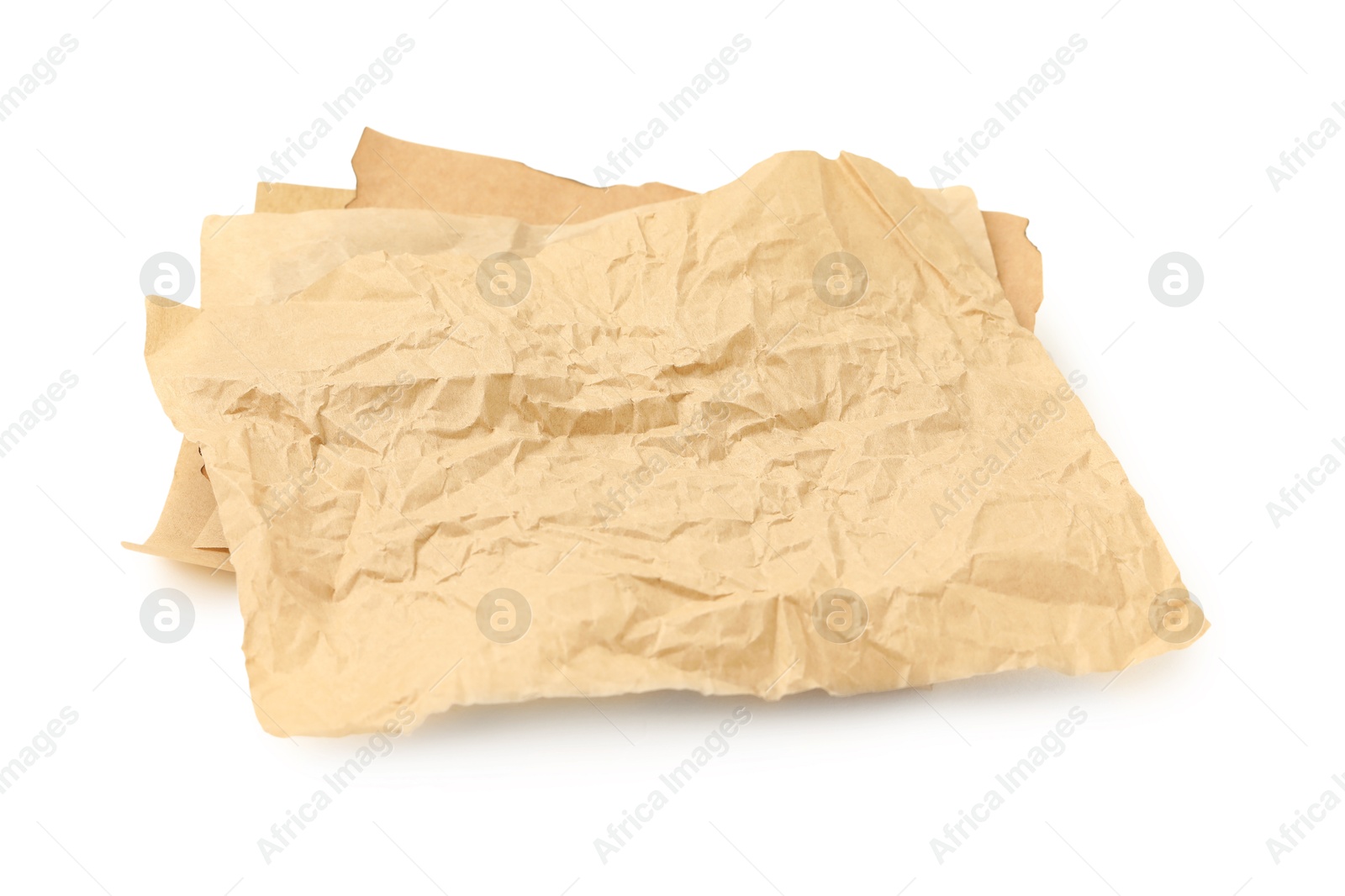 Photo of Crumpled kraft paper sheets isolated on white