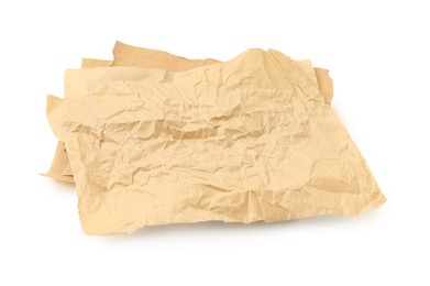 Photo of Crumpled kraft paper sheets isolated on white