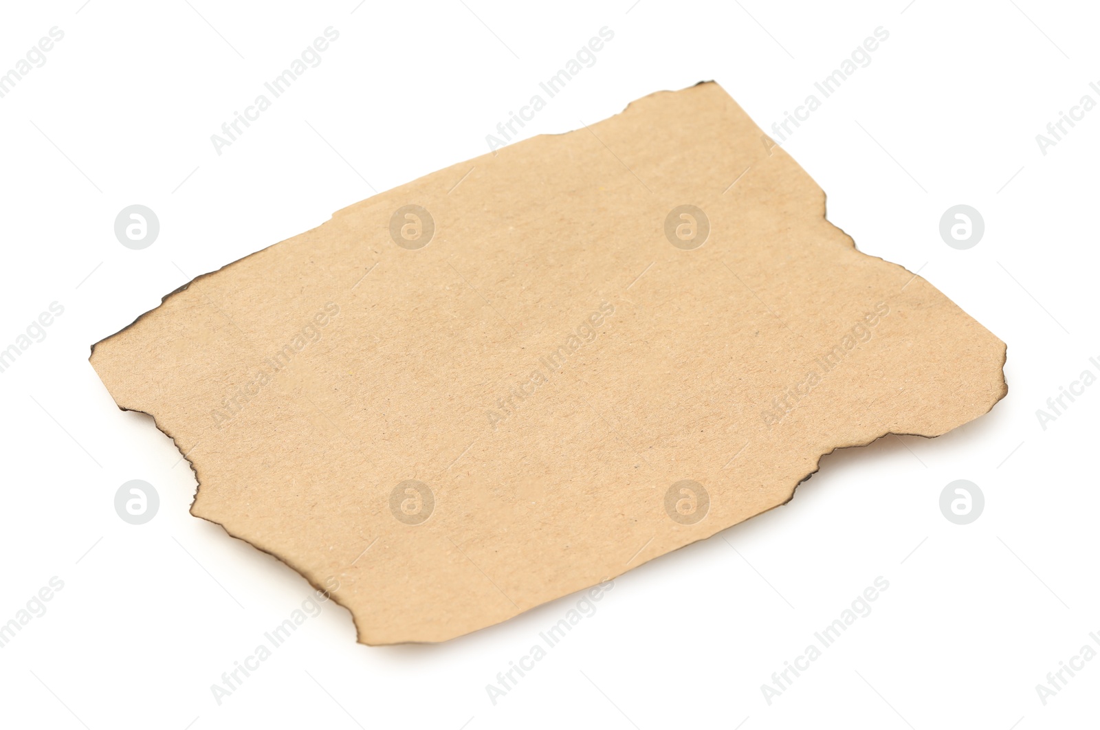 Photo of Piece of old paper with dark burnt borders isolated on white